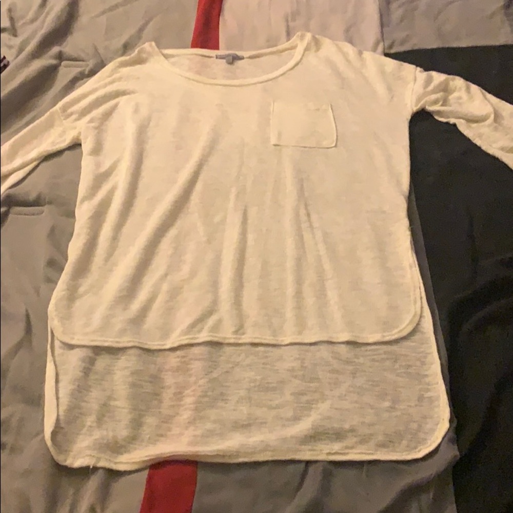 Cream top with gold buttons on sleeves